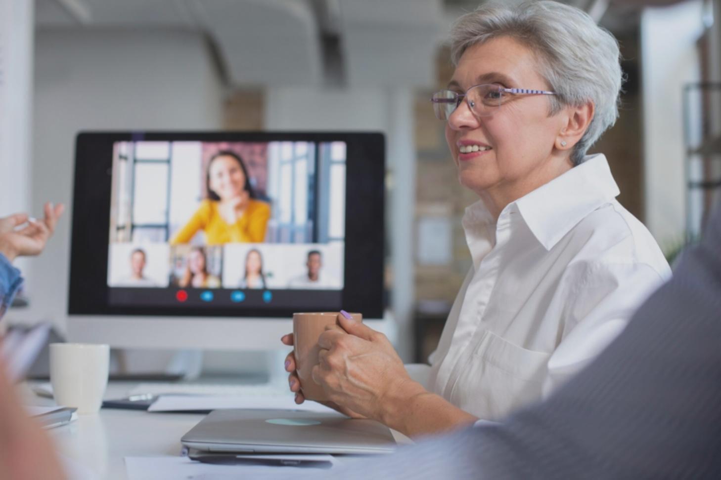 Professional business presentation training session with clear financial charts and engaged participants